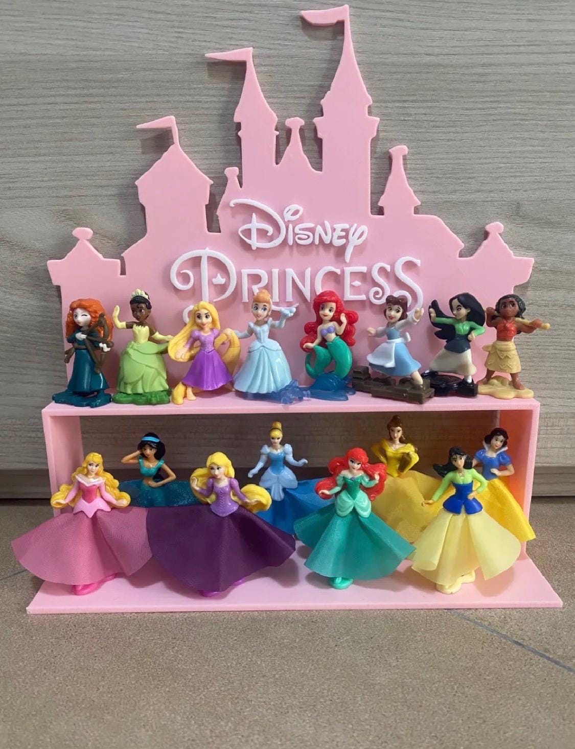 Disney shelf to hold mini princesses.