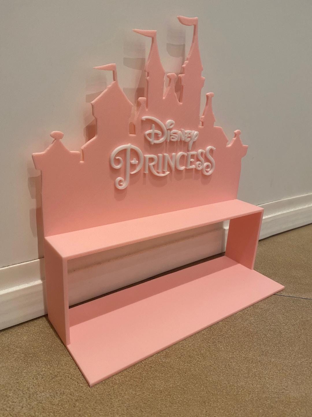 Disney shelf to hold mini princesses.