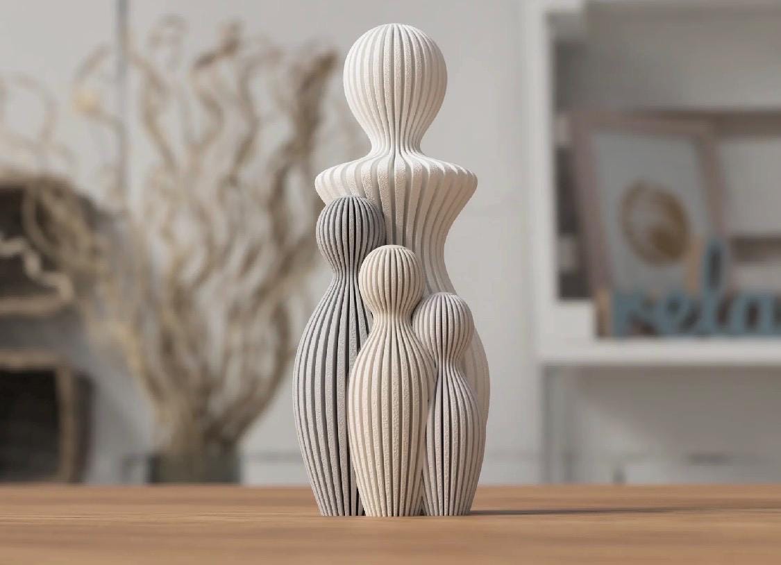 Mother’s Day figurine with 1-4 children.  Modern style