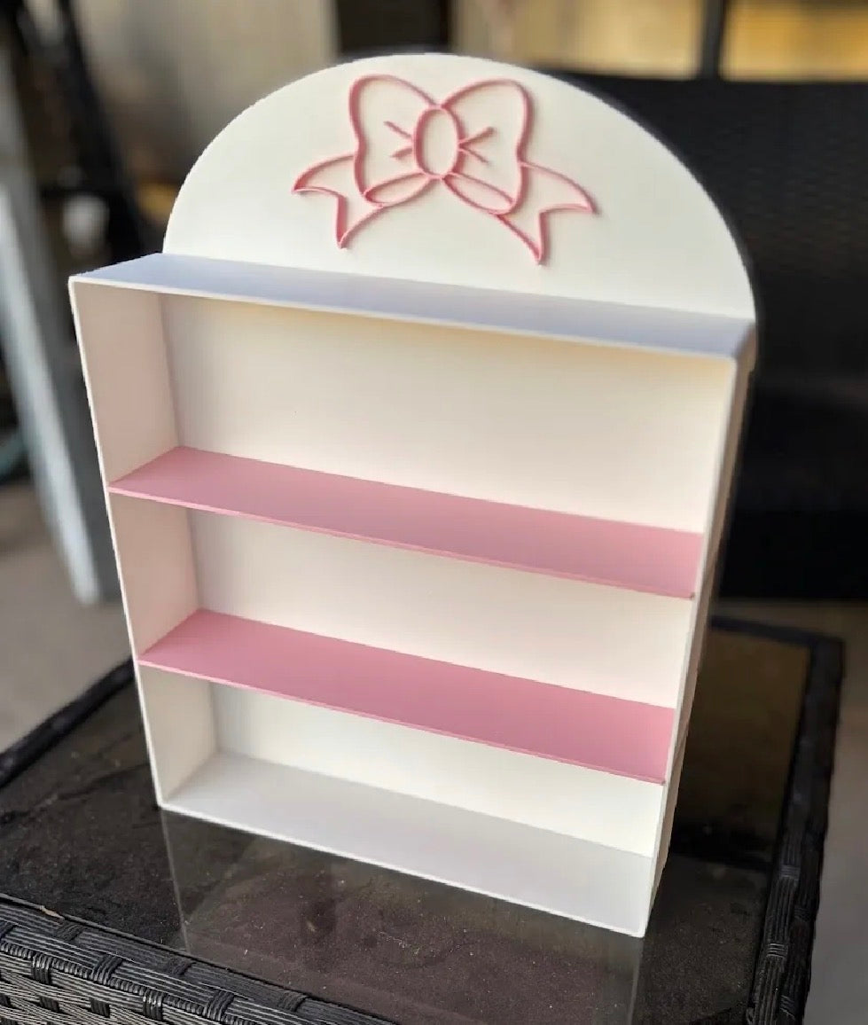 Coquette bow display shelf — front view