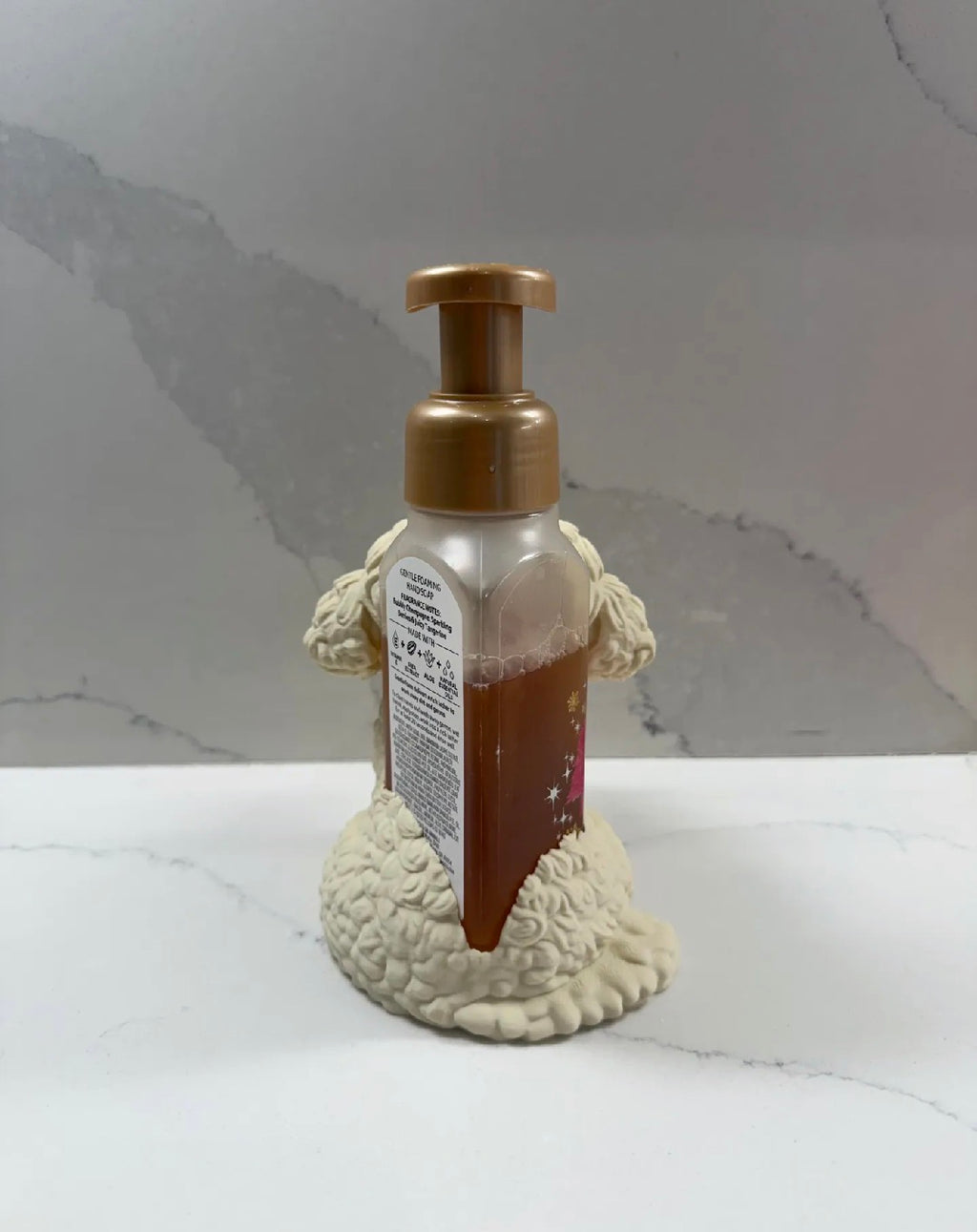 Curly dog soap dispenser holder angled side view