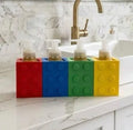 Building brick soap dispenser holders red blue green yellow set at sink