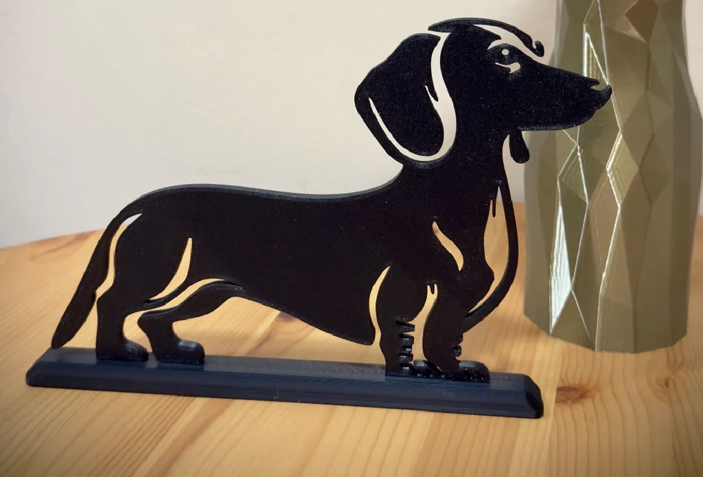 Dachshund silhouette stand side view on wooden table