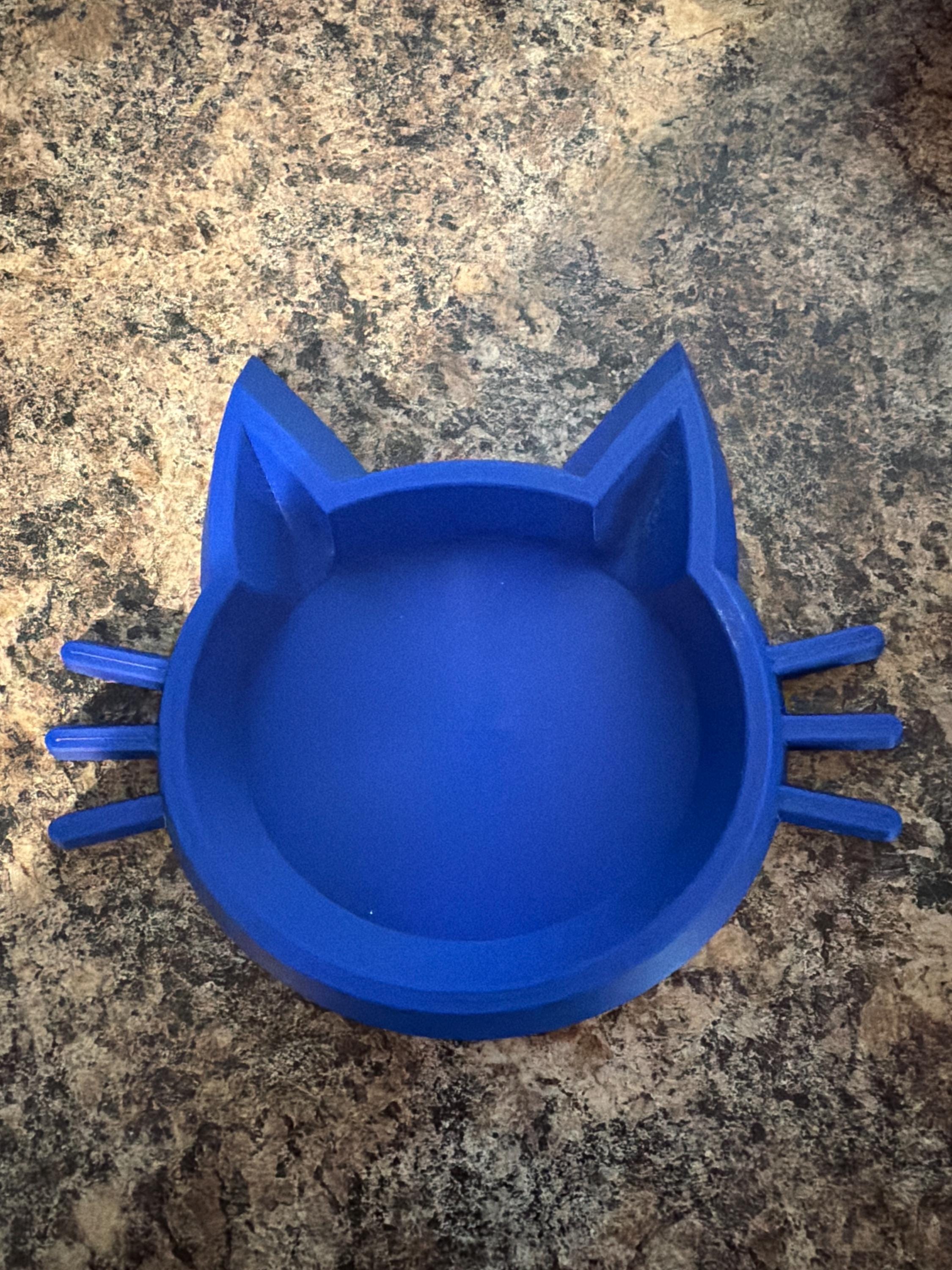 Cat shaped food bowls. Multiple colors available.