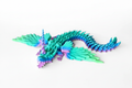 3D printed Draginic dragon in teal and purple gradient