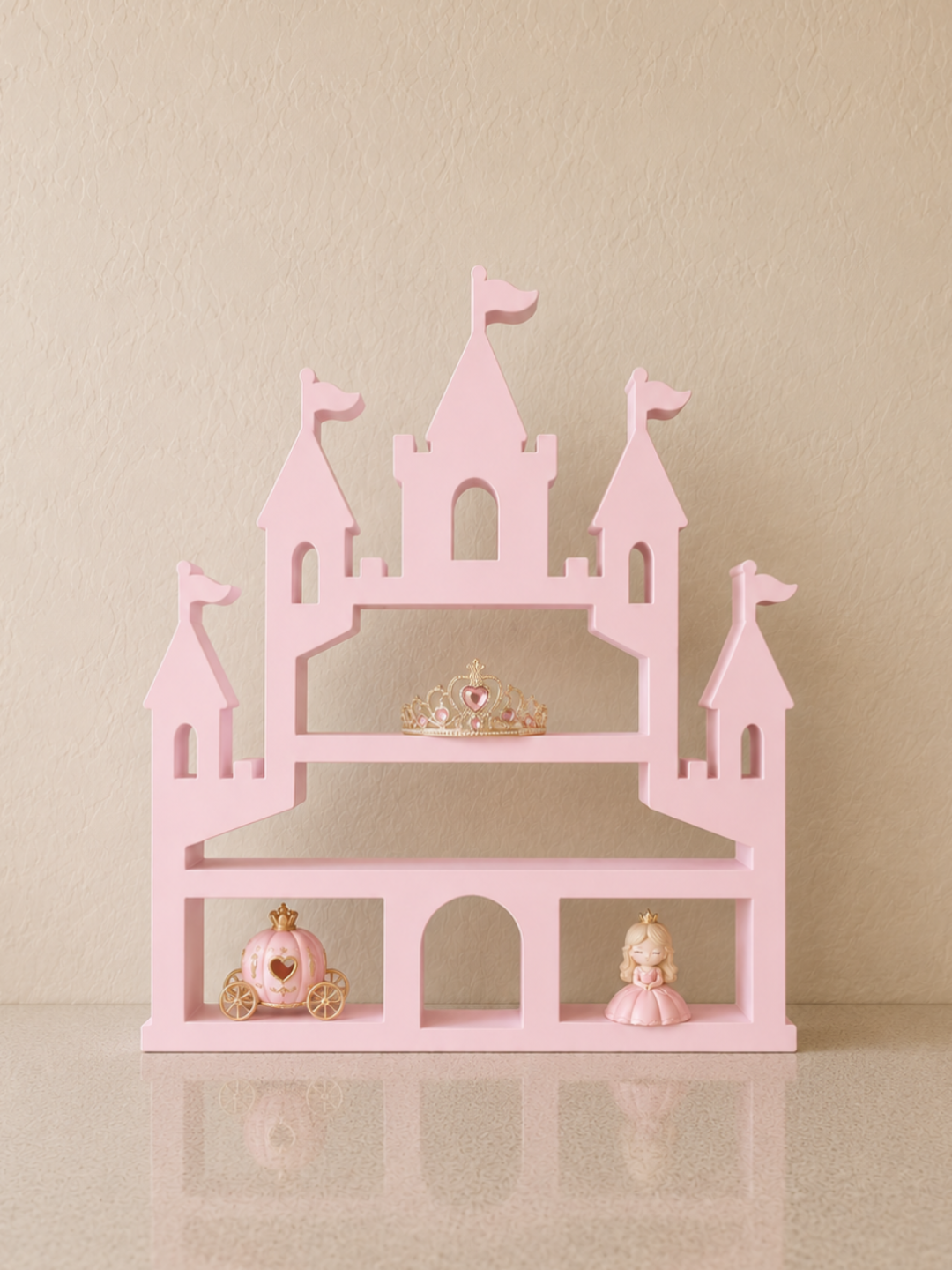 Pink princess castle display shelf with crown and figurines