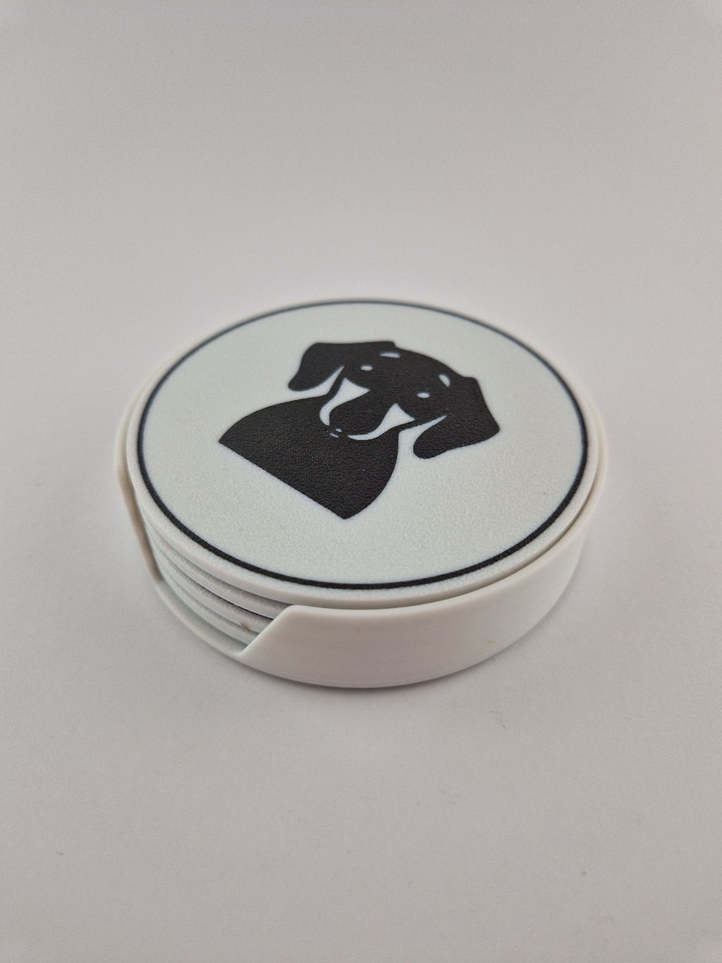 Dachshund coaster set stacked in holder front view