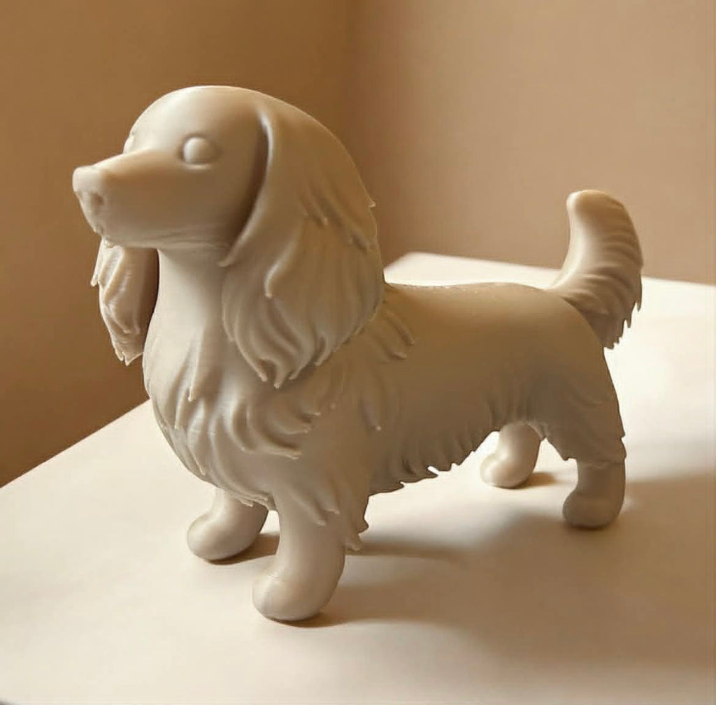 Long-haired dachshund figurine full body side view in cream finish