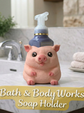 Chubby pig soap dispenser holder lifestyle shot with soap bottle