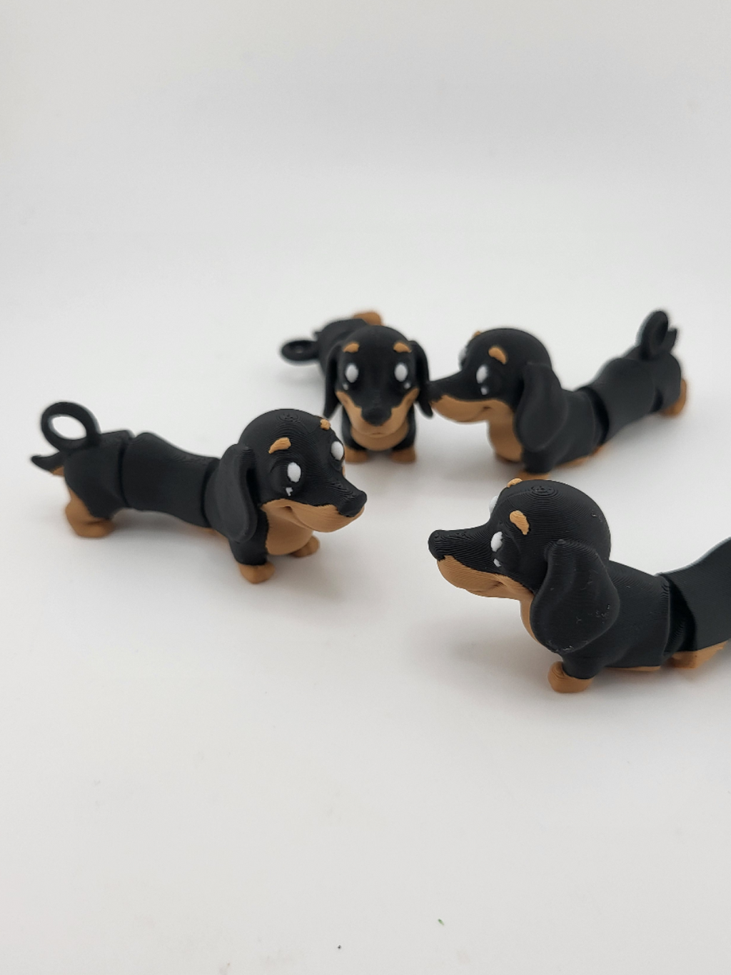 Flexi dachshund keychains group shot on white background