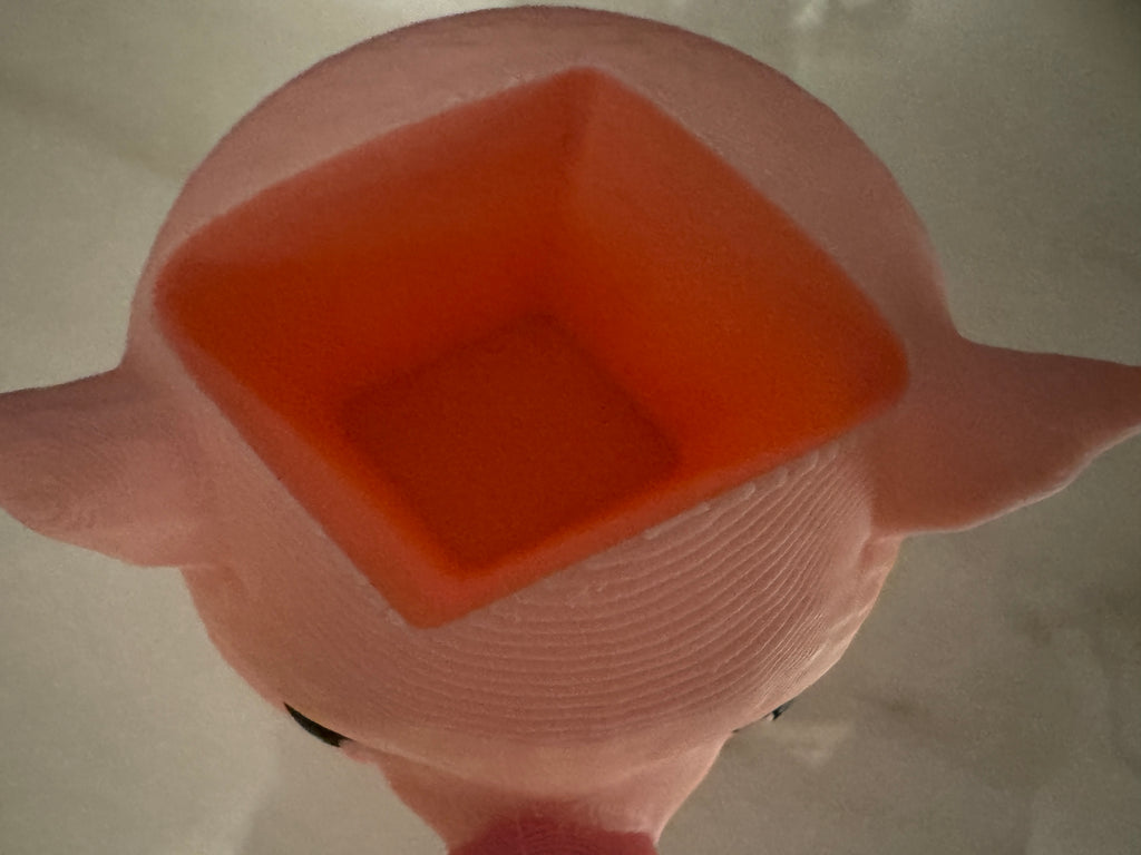 Chubby pig soap dispenser holder top view showing interior opening