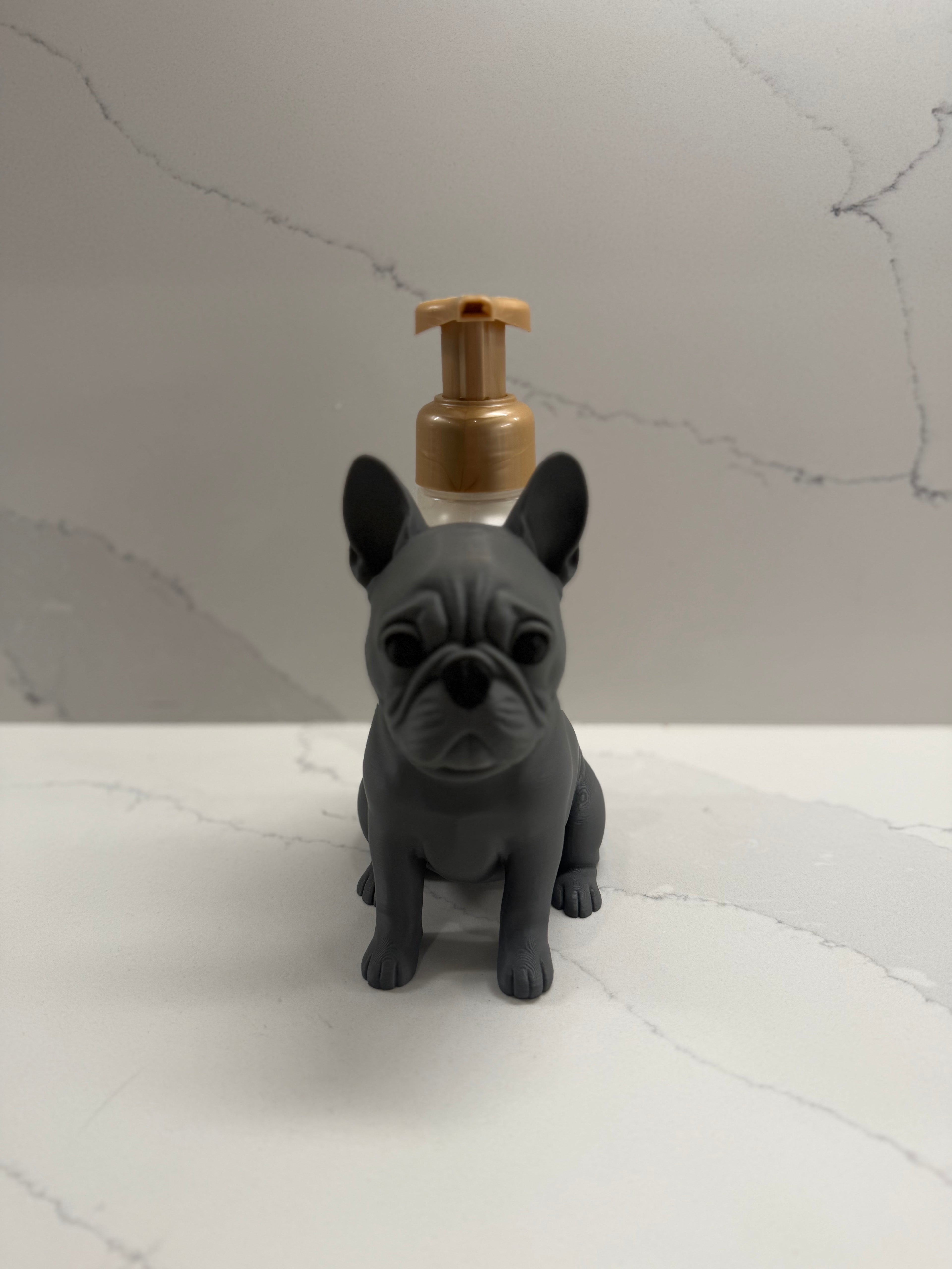 French bulldog soap dispenser holder front view full body on marble