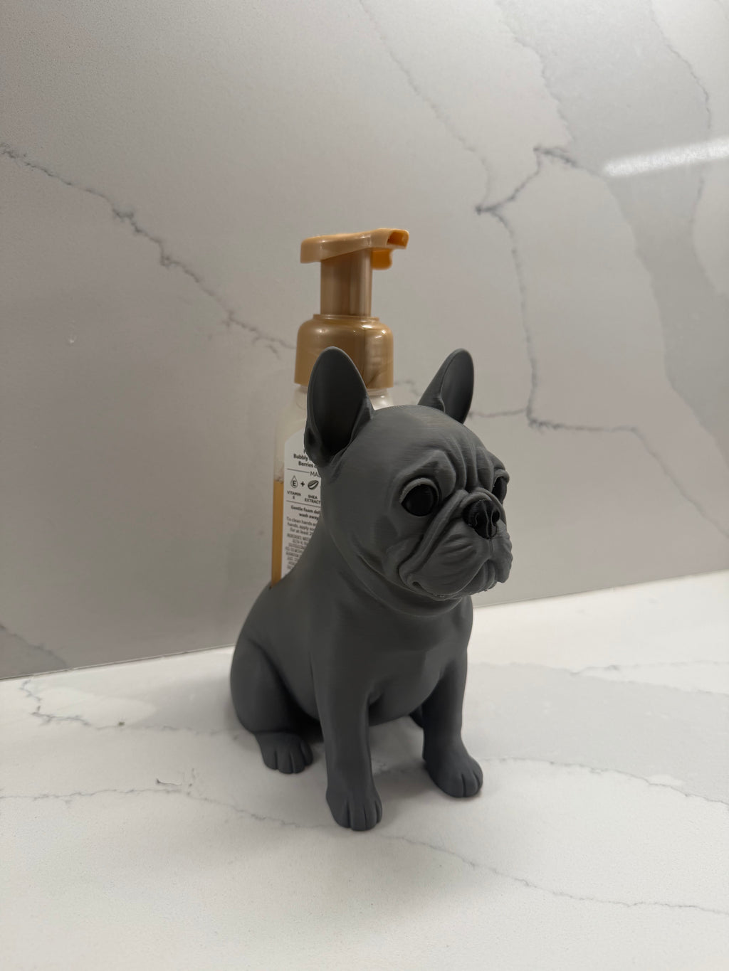 French bulldog soap dispenser holder side view with soap bottle