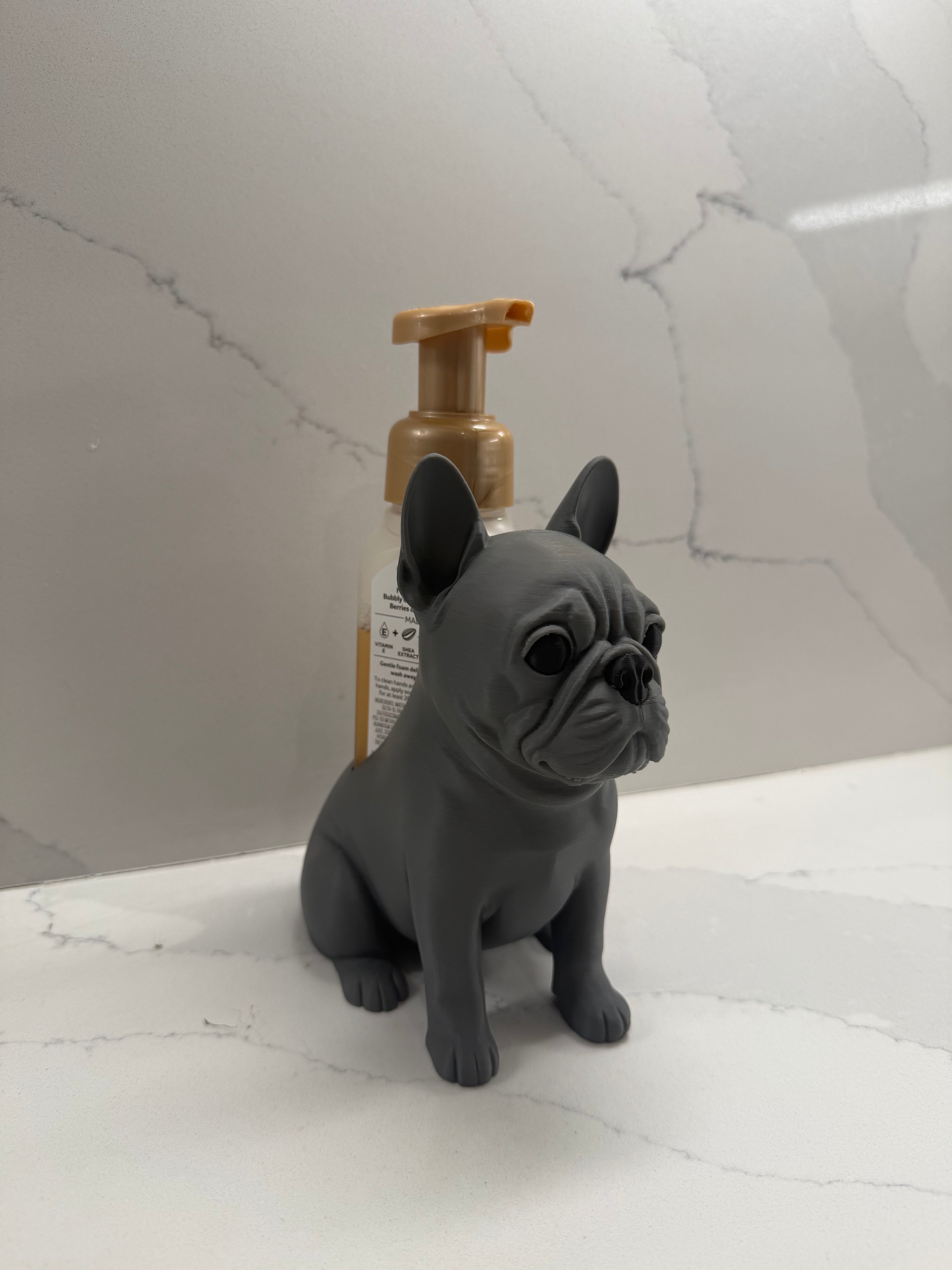 French bulldog soap dispenser holder side view with soap bottle