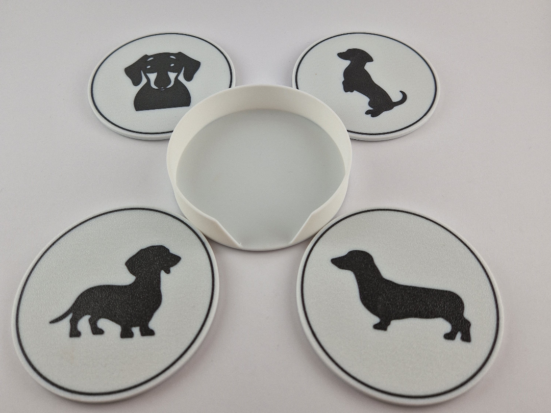 Dachshund coaster set of 4 spread out with holder showing all poses